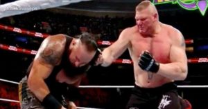 Brock Lesnar Punches Braun Strowman - Wrestling Examiner