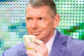 Vince McMahon with Money - Wrestling Examiner